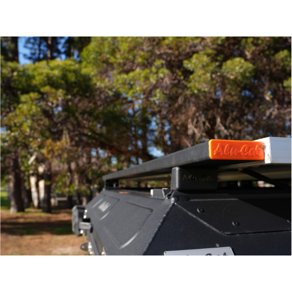 Barres de toit Alu-Cab 1250mm alu, capuchons oranges - Offroad